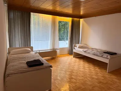 Ein Bett oder Betten in einem Zimmer der Unterkunft Monteurwohnung 6P 2 bathrooms kitchen