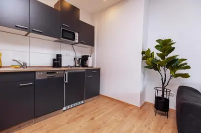 Küche/Küchenzeile in der Unterkunft vivid & red - Netflix - City - Wifi - 4 Person