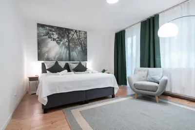 Ein Bett oder Betten in einem Zimmer der Unterkunft Central Studio Near Main Train Station & Old City Hall