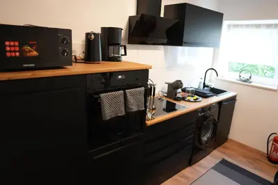 Küche/Küchenzeile in der Unterkunft Stylisches City Apartment im Pott Modern und Gemütlich