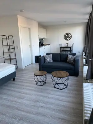 Ein Sitzbereich in der Unterkunft City Appartment