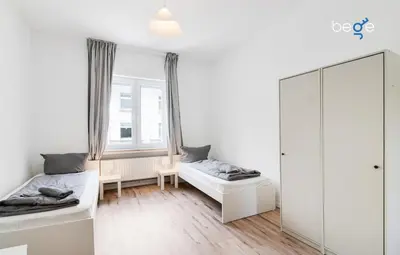 Ein Bett oder Betten in einem Zimmer der Unterkunft BEGE APARTMENTS FlatLine