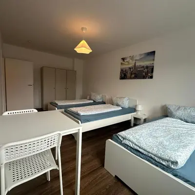 Ein Bett oder Betten in einem Zimmer der Unterkunft WDI - Workers Apartments 2
