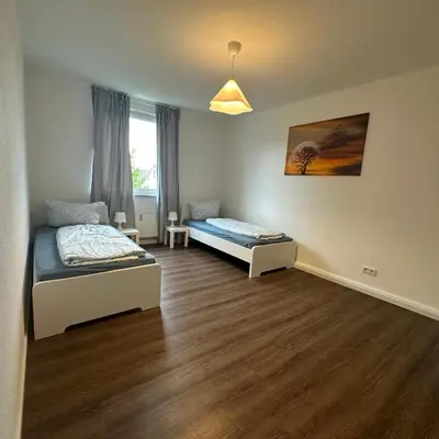Ein Bett oder Betten in einem Zimmer der Unterkunft WDI - Workers Apartments 2