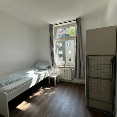 Ein Bett oder Betten in einem Zimmer der Unterkunft WDI - WorkersSpace 2