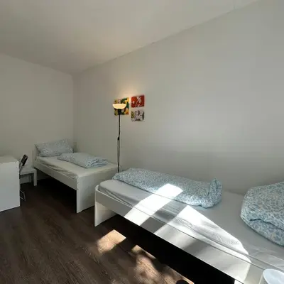 Ein Bett oder Betten in einem Zimmer der Unterkunft WDI - WorkersSpace 2