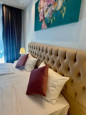 Ein Bett oder Betten in einem Zimmer der Unterkunft Twins Hotel