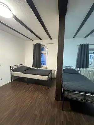 Ein Bett oder Betten in einem Zimmer der Unterkunft Apartment Oberhausen