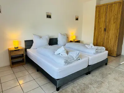 Ein Bett oder Betten in einem Zimmer der Unterkunft Zentrale Unterkunft in Selm