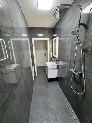 Ein Badezimmer in der Unterkunft Luxury Apartment I