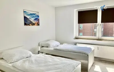 Ein Bett oder Betten in einem Zimmer der Unterkunft BEGE APARTMENTS FlexiFlat