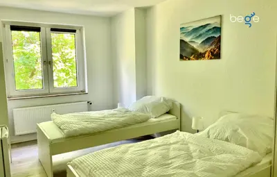 Ein Bett oder Betten in einem Zimmer der Unterkunft BEGE APARTMENTS FlexiFlat