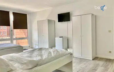 Ein Bett oder Betten in einem Zimmer der Unterkunft BEGE APARTMENTS FlexiFlat