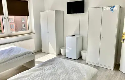 Ein Bett oder Betten in einem Zimmer der Unterkunft BEGE APARTMENTS FlexiFlat