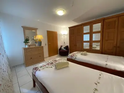 Ein Bett oder Betten in einem Zimmer der Unterkunft Citynahe Komfortwohnung für bis 6 Personen