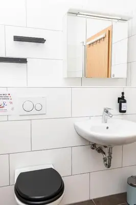 Ein Badezimmer in der Unterkunft CosyHomes24 - centrally with balcony and garage - IL01b
