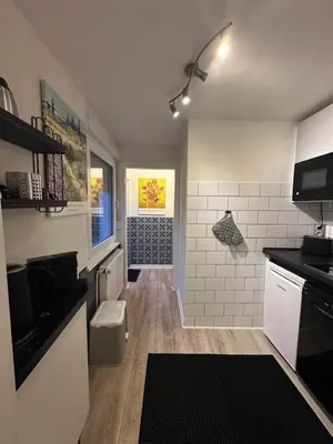 Küche/Küchenzeile in der Unterkunft Apartment Südhöhen - für Geschäfts- Privatreisen mit naher Autobahnanbindung Düsseldorf & Köln
