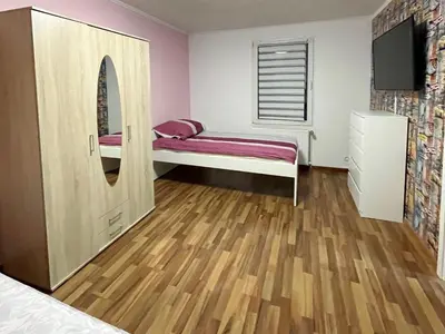 Ein Bett oder Betten in einem Zimmer der Unterkunft Spacious Apartment in Wuppertal