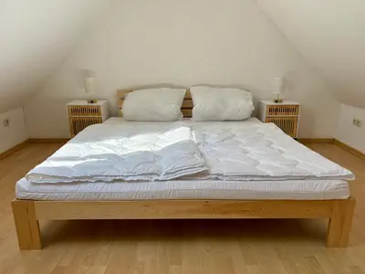 Ein Bett oder Betten in einem Zimmer der Unterkunft Ruhige, zentrale Lage - Modernes Apartment