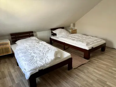 Ein Bett oder Betten in einem Zimmer der Unterkunft Ruhige, zentrale Lage - Modernes Apartment