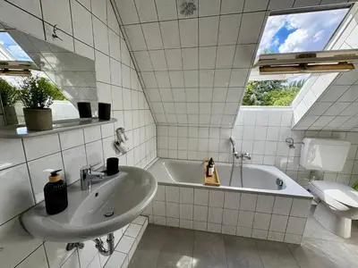 Ein Badezimmer in der Unterkunft Ruhige, zentrale Lage - Modernes Apartment