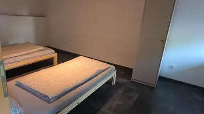Ein Bett oder Betten in einem Zimmer der Unterkunft Sweet Ferien & Monteurs Appartement