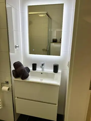 Ein Badezimmer in der Unterkunft Feeling Home - Moderne 3-Zimmer Ferienwohnung am Uniklinikum, Nähe Messe und Rüttenscheid, 