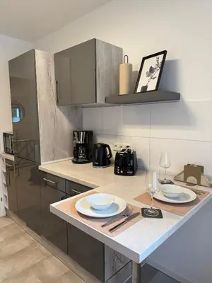 Küche/Küchenzeile in der Unterkunft Feeling Home - Moderne 3-Zimmer Ferienwohnung am Uniklinikum, Nähe Messe und Rüttenscheid, 