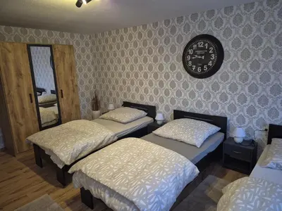 Ein Bett oder Betten in einem Zimmer der Unterkunft Ferienwohnung