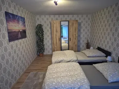 Ein Bett oder Betten in einem Zimmer der Unterkunft Ferienwohnung