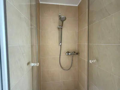 Ein Badezimmer in der Unterkunft Gemütliche Ferienwohnung