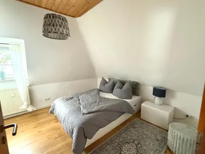 Ein Bett oder Betten in einem Zimmer der Unterkunft Gemütliche Ferienwohnung