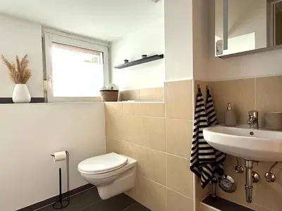 Ein Badezimmer in der Unterkunft Gemütliche Ferienwohnung