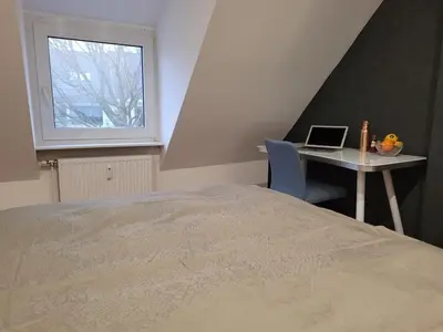 Ein Bett oder Betten in einem Zimmer der Unterkunft Modern 52 m2 apartment with air conditioning close to Messe Düsseldorf & Köln