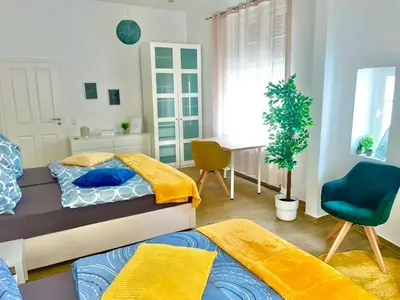 Ein Bett oder Betten in einem Zimmer der Unterkunft NEU- APPARTMENT in HAGEN nähe DORTMUND - 3 Parking! 3 Double-Bed! 2 Bedrooms, WIFI, COFFEMASHINE-Fully Automatic, KITCHEN, NETFLIX,DISNEY,MAGENTA