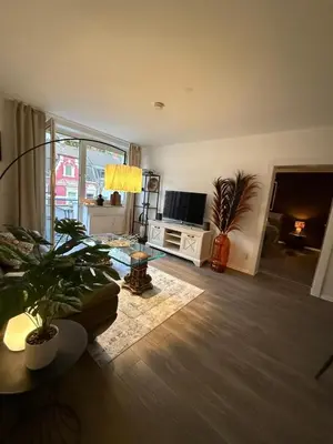 TV/Unterhaltungsangebot in der Unterkunft Rüttenscheid Design Apartment mit Balkon Office