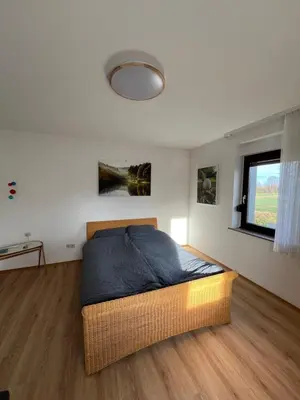 Ein Bett oder Betten in einem Zimmer der Unterkunft Wohnung nahe dem Neandertal