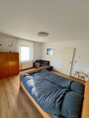 Ein Bett oder Betten in einem Zimmer der Unterkunft Wohnung nahe dem Neandertal