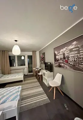 Ein Bett oder Betten in einem Zimmer der Unterkunft BEGE APARTMENTS StaySpace