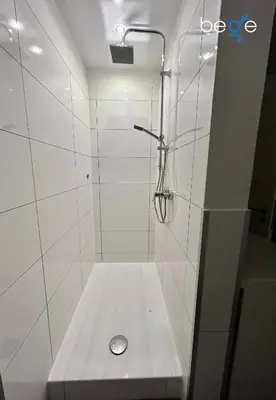 Ein Badezimmer in der Unterkunft BEGE APARTMENTS StaySpace