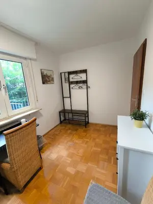 Ein Bett oder Betten in einem Zimmer der Unterkunft Unterkunft Uni-nähe mit Garten