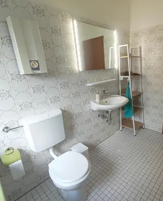 Ein Badezimmer in der Unterkunft Unterkunft Uni-nähe mit Garten