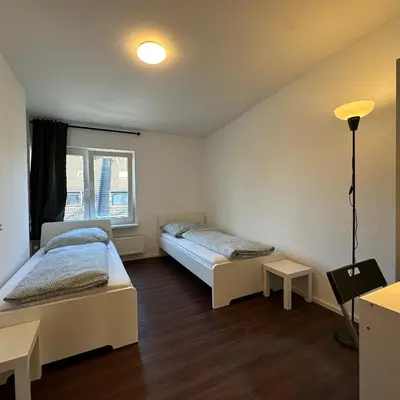 Ein Bett oder Betten in einem Zimmer der Unterkunft WDI - WorkersSpace 3