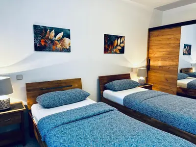 Ein Bett oder Betten in einem Zimmer der Unterkunft Zentral und ruhig - gut ausgestattete Wohnung mit Balkon für 1-3 Personen