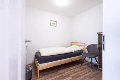 Ein Bett oder Betten in einem Zimmer der Unterkunft Geräumige Monteurwohnung in Ratingen mit WLAN und Parkplatz