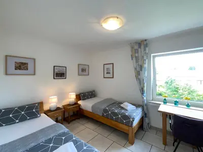 Ein Bett oder Betten in einem Zimmer der Unterkunft Gemütliche Komfortwohnung in ruhiger Grünlage - ideal für bis zu 3 Gäste