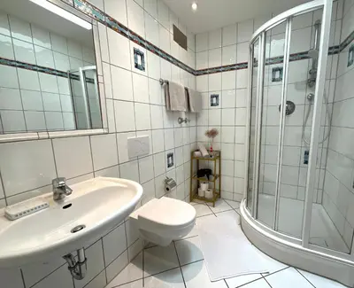 Ein Badezimmer in der Unterkunft Gemütliche Komfortwohnung in ruhiger Grünlage - ideal für bis zu 3 Gäste