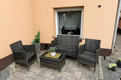 Ein Sitzbereich in der Unterkunft Premium 2 Zimmer 4 Bett Apartment, SmartTV , Terrasse
