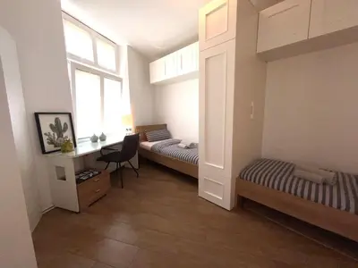 Ein Bett oder Betten in einem Zimmer der Unterkunft Altbau trifft auf Moderne - neuwertige Komfortwohnung für bis 2 Personen