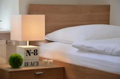 Ein Bett oder Betten in einem Zimmer der Unterkunft Altbau trifft auf Moderne - neuwertige Komfortwohnung für bis 2 Personen